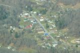 Naoma, WV. Judy Bonds Center is large tan building with brown roof in center of photo. Flight by Southwings.org.